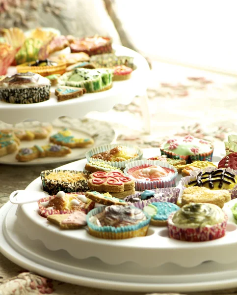 Group of cupcakes and biscuits — Stock Photo, Image