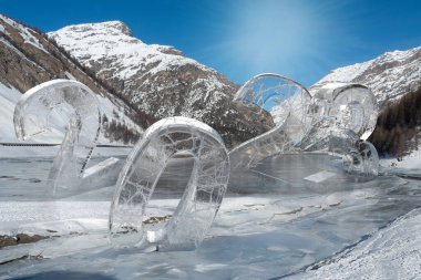 Glass number 2023 in lake during winter mountains on New Year. Snow happy transparent banner for business. 3D rendering.