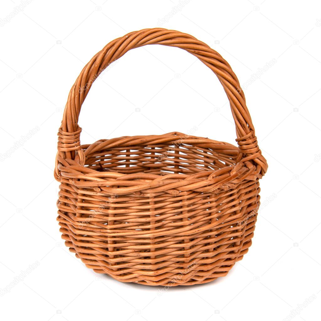 Wicker brown basket isolated on the white background