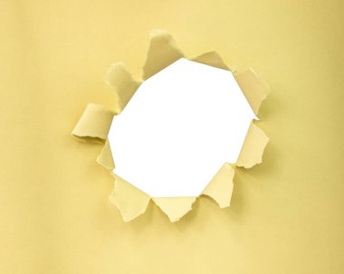 Yellow color paper with circle hole in damaged background