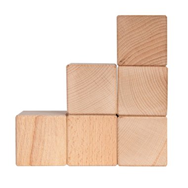 Beyaz arkaplanda izole edilmiş yaratıcı metin için ahşap küpler tuğla yapı