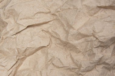 Buruşuk kahverengi kağıt işçiliği desenli arka plan