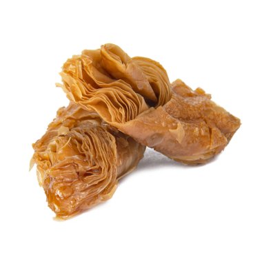 Beyaz arka planda izole edilmiş bal baklavası