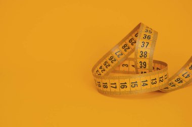 Teyp ölçüsü, telif alanı ile diyet renkli arkaplan