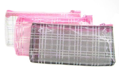 Multicolored pencil pen case container isolated on the white background