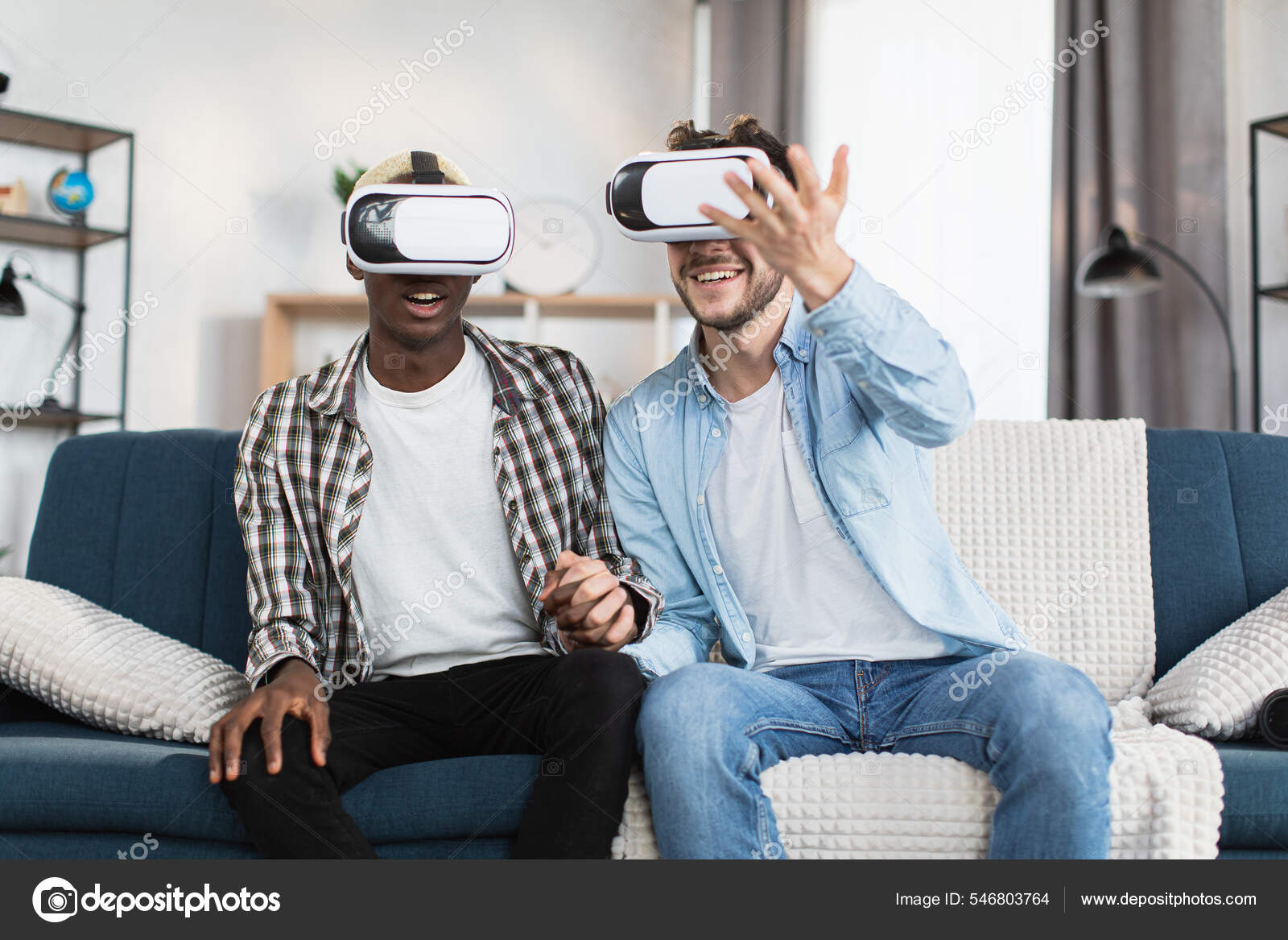 Same sex couple using VR goggles during free time at home Stock Photo by ©sofiiashunkina@gmail 546803764 image pic