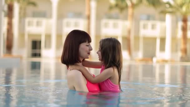 Daughter and her mother together in a vacation villa on the sea — Stockvideo