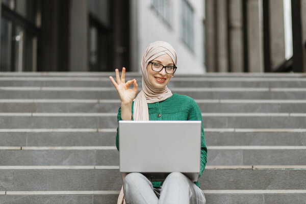 Smiling Young Woman Hijab Woking Wireless Laptop While Sitting Stairs Stock Image
