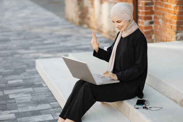 Portrait Smiling Happy Muslim Woman Relaxing Using Digital Laptop While — 스톡 사진