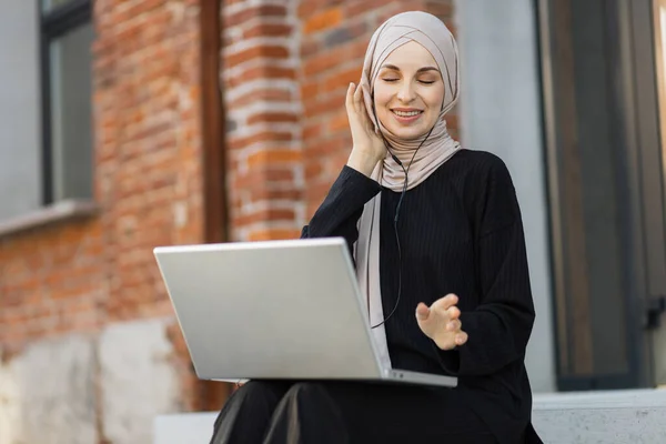 Music Streaming Platform Concept Joyful Muslim Girl Hijab Wearing Wireless — 스톡 사진