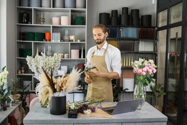 Portrait Young Attractive Bearded Male Florist Holding White Flower Looking —  Fotos de Stock