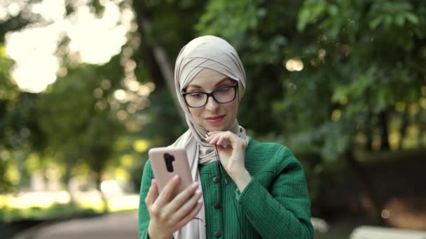 Portrait Young Modern Arabian Woman Holding Mobile Phone Listening Music – Stock-video