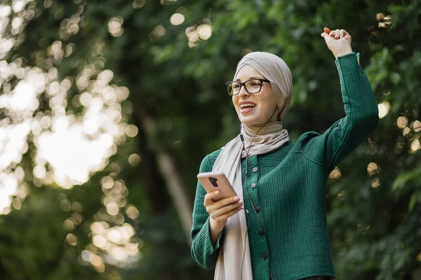 Music Streaming Platform Concept Joyful Muslim Girl Hijab Wearing Wireless — Stock Fotó