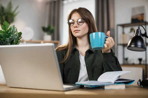 Attractive Female Freelancer Cup Coffee Casual Outfit Using Modern Laptop — Stockfoto