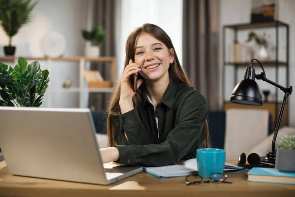 Positive Young Woman Talking Mobile Working Laptop Bright Office Caucasian — Fotografia de Stock