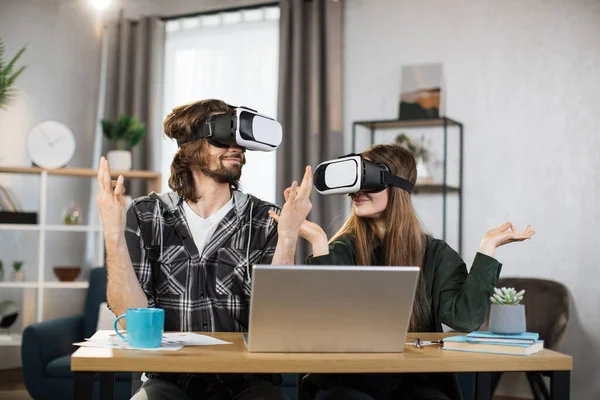 Young People Playing Games Home Meditating Using Glasses Laptops Happy — Stock Fotó