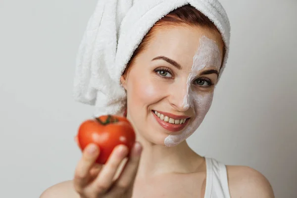 Beautiful Young Woman Cosmetic Mask Half Face Towel Holding Tomato — Fotografia de Stock