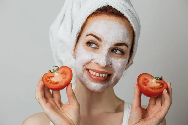 Attractive Young Woman White Cosmetic Mask Her Face Holding Sliced — Stok Foto