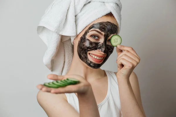 Portrait Smiling Young Woman Cosmetic Mask Face Holding Slice Cucumber — Stok Foto