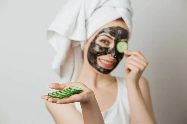 Portrait Smiling Young Woman Cosmetic Mask Face Holding Slice Cucumber — Zdjęcie stockowe