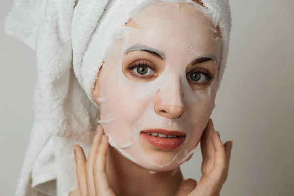 Attractive Young Woman Cotton Mask Face Looking Camera Grey Background — Fotografia de Stock