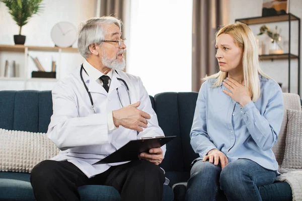 Male Aged Doctor Listening Sick Blond Woman Patient Writing Prescription — 图库照片