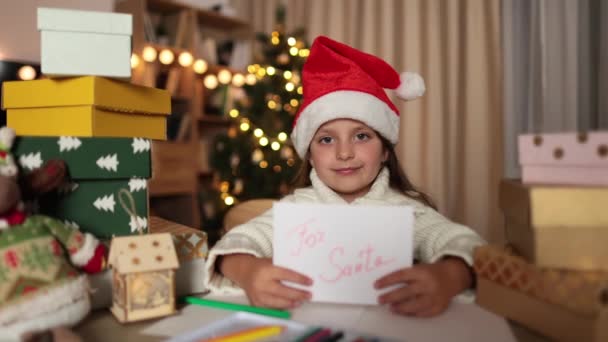 Christmas Holidays Childhood Concept Smiling Caucasian Girl Red Hat Holding — Stock Video