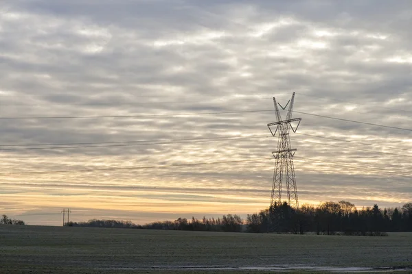 Moc pylon w zachodzie słońca — Zdjęcie stockowe