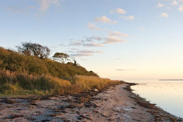 Zonsondergang bij de inlaat van — Stockfoto