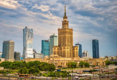 Evening clouds over Palace of Culture and Science and skyscrapers in Warsaw, Poland