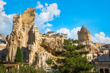 Blue sky over conical caves in Cappadocia, Turkey