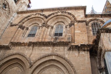 Indestructible staircase on the wall of the Church of the Holy Sepulcher. Temple restoration. A staircase was attached to the windows of the cathedral for the repair of the temple. An ancient temple with a staircase near the windows