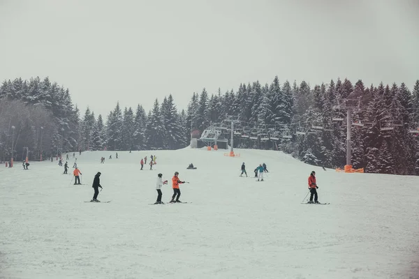 Skiers Ride Snowy Mountain Winter Holiday Concept —  Fotos de Stock