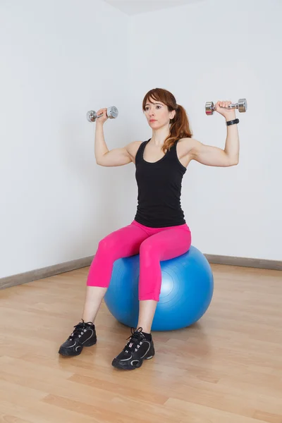 Fit women doing gym exercise — Stock Photo, Image