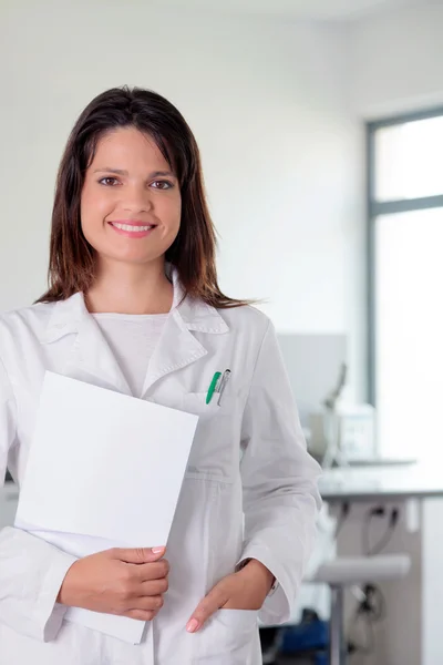 Young woman doctor in laboratory environment — Stock Photo, Image