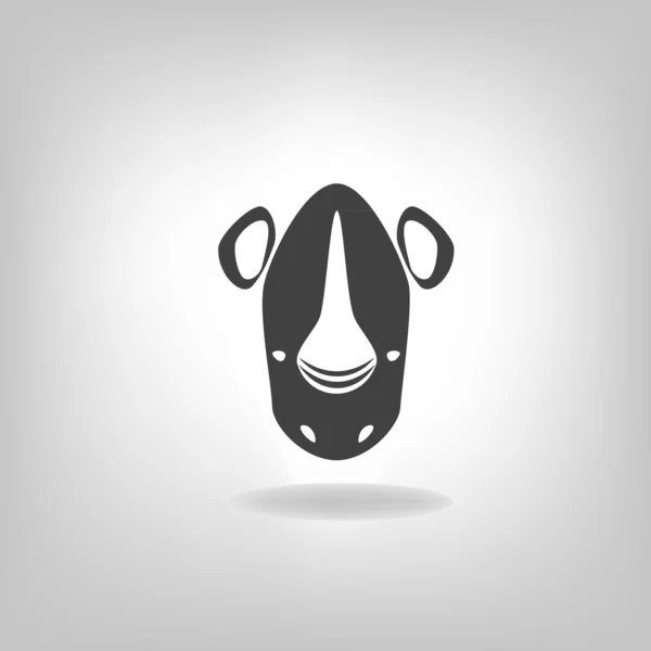 Emblema un rinoceronte sobre un fondo claro — Vector de stock