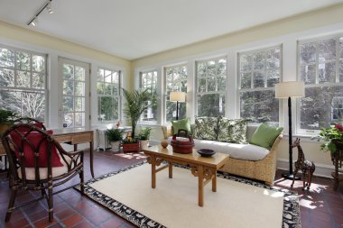 kırmızı tuğla döşeme ile Sunroom