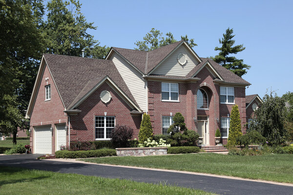 Brick home with arched entry