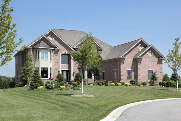 Brick home with arched entry — Stock Photo, Image