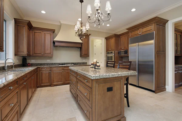 Kitchen with granite island Stock Picture