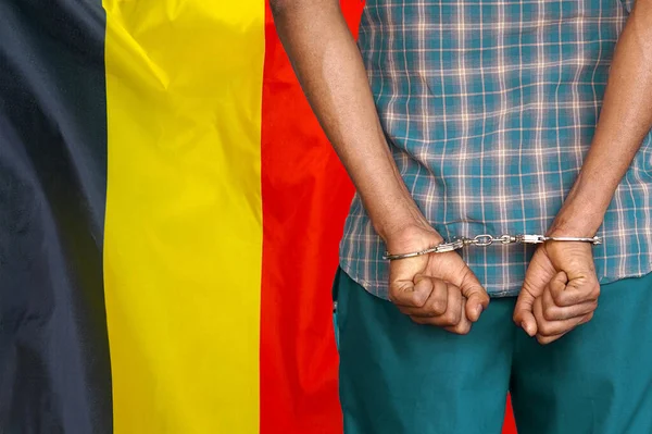 African Man Handcuffs Background Belgium Flag Back View Concept Prisons — Zdjęcie stockowe