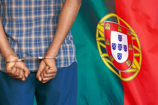 African Man Handcuffs Background Portugal Flag Back View Concept Prisons — Zdjęcie stockowe