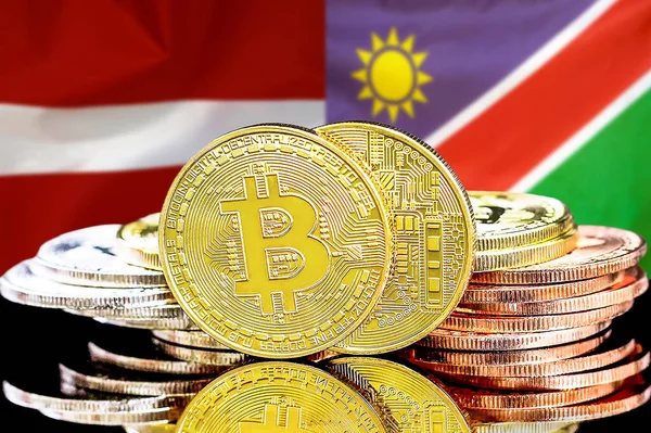 Letonya ve Namibya bayrağının arka planında bitmadeni paralar. Letonya ve Namibya 'daki kripto para birimi ve engelleme teknolojisi yatırımcıları için kavram