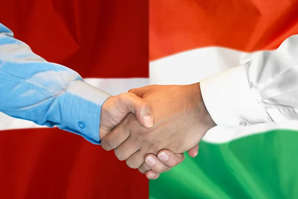 Business Handshake Background Two Flags Men Handshake Background Hungary Latvia — Zdjęcie stockowe