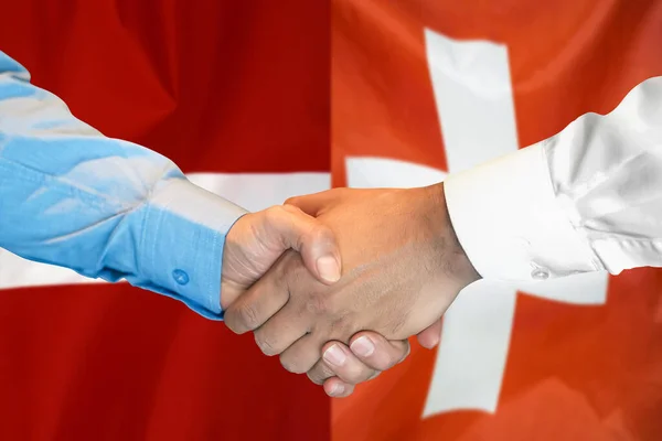 Business Handshake Background Two Flags Men Handshake Background Switzerland Latvia — Zdjęcie stockowe