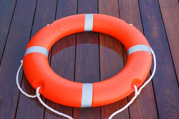 Red Lifebuoy Pool Ring Wooden Floor Swimming Pool — 스톡 사진