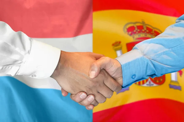 Business Handshake Background Two Flags Men Handshake Background Luxembourg Spain — Stockfoto