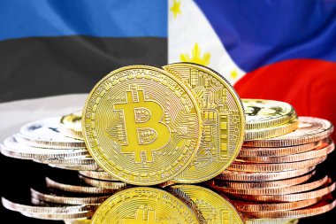 Estonya ve Filipinler bayrağının arka planında bitcoinler. Estonya ve Filipinler 'deki kripto para birimi ve engelleme teknolojisi yatırımcıları için kavram