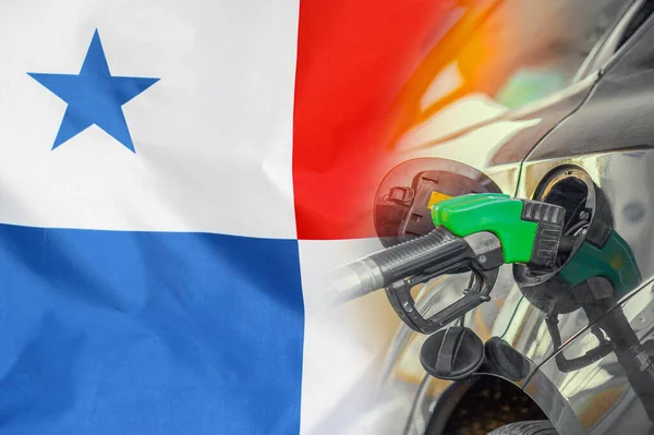 Car with a fuel injector on Panama flag background. Record prices fuel for population. Gasoline price increase during energy and fuel world crisis in Panama