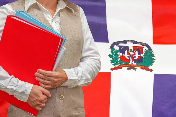 Woman Holding Red Folder Dominican Republic Flag Background Education Jurisprudence — Stock fotografie